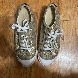 gold coach tennis shoes (thrifted) needs cleaning